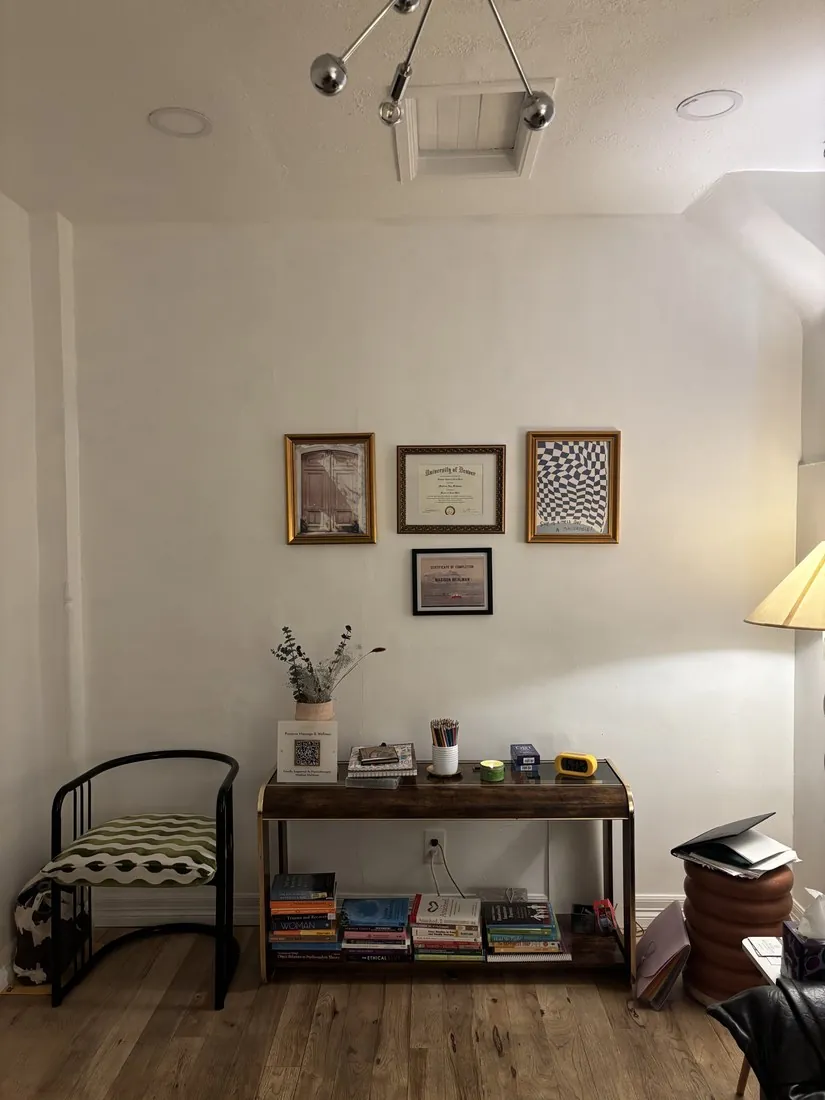 Therapy room with bookshelf and artwork